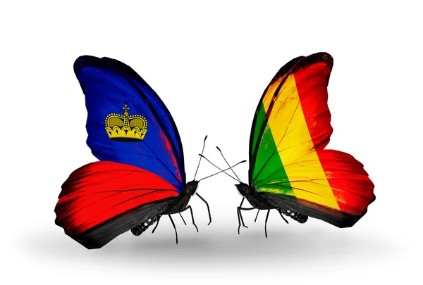 Butterflies with Liechtenstein and Mauritius flags on wings — Stock Photo, Image