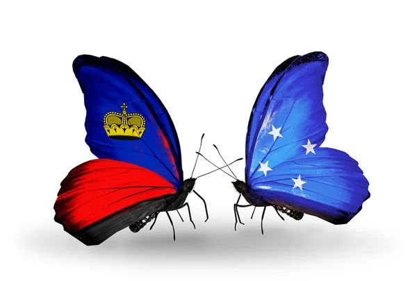 Mariposas con banderas de Liechtenstein y Micronesia en alas — Foto de Stock