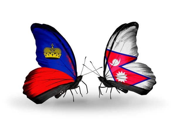 Mariposas con banderas de Liechtenstein y Nepal en alas — Foto de Stock