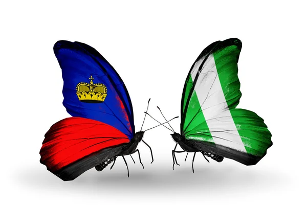 Mariposas con banderas de Liechtenstein y Nigeria en alas — Foto de Stock