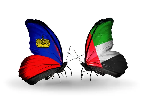 Papillons avec drapeaux Liechtenstein et EAU sur les ailes — Photo