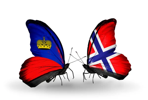 Papillons avec drapeaux Liechtenstein et Norvège sur les ailes — Photo