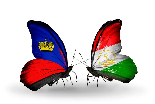 Papillons avec drapeaux Liechtenstein et Tadjikistan sur les ailes — Photo