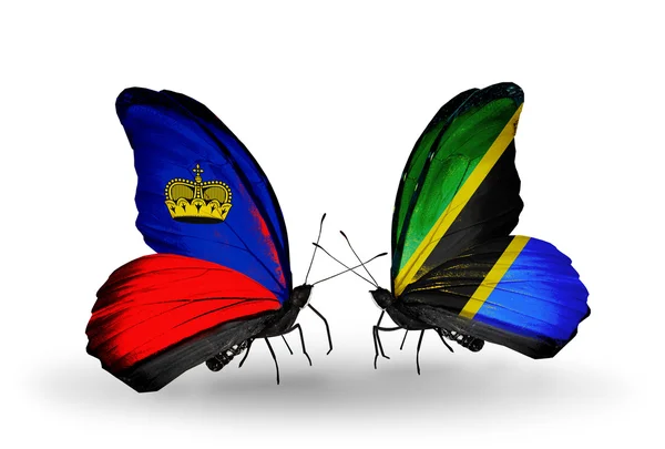 Butterflies with Liechtenstein and Tanzania flags on wings — Stock Photo, Image