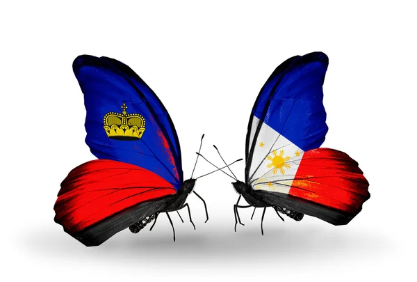 Butterflies with Liechtenstein and Philippines flags on wings — Stock Photo, Image