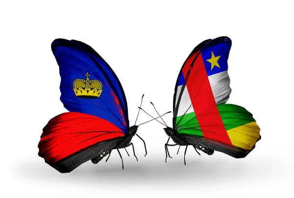 Butterflies with Liechtenstein and CAR flags on wings — Stock Photo, Image