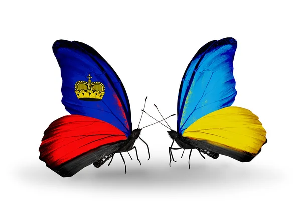 Farfalle con bandiere Liechtenstein e Ucraina sulle ali — Foto Stock