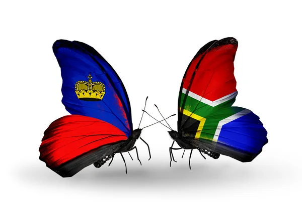 Butterflies with Liechtenstein and South Africa flags — Stock Photo, Image