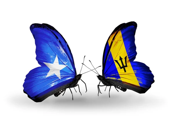 Butterflies with Somalia and  Barbados flags — Stock Photo, Image