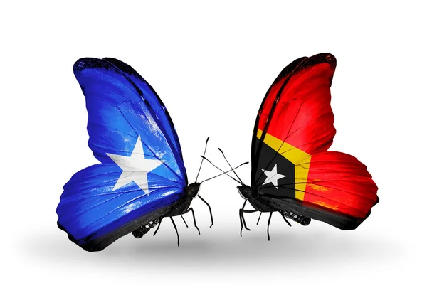 Mariposas con banderas de Somalia y Timor Oriental —  Fotos de Stock