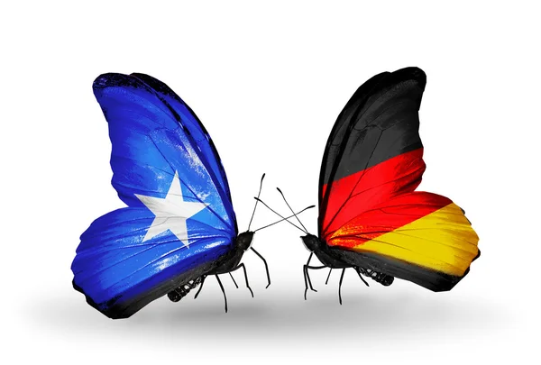 Butterflies with Somalia and Germany flags — Stock Photo, Image