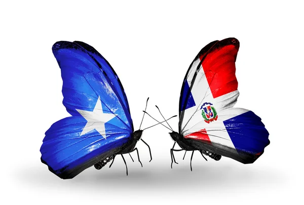 Butterflies with Somalia and Dominicana flags — Stock Photo, Image