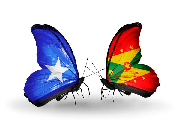 Motyle z Somalii i Grenada flagi — Zdjęcie stockowe