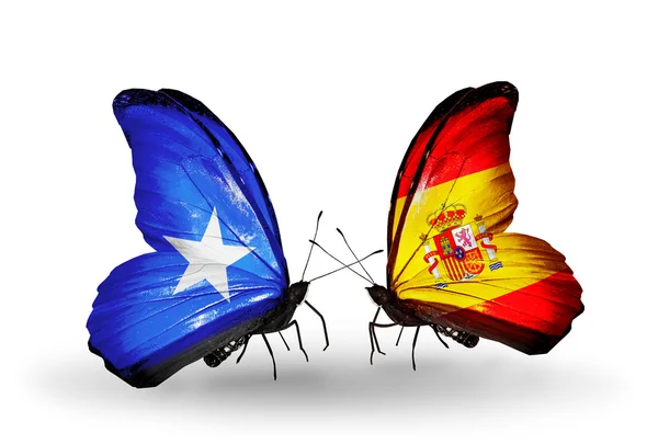 Borboletas com bandeiras da Somália e Espanha — Fotografia de Stock