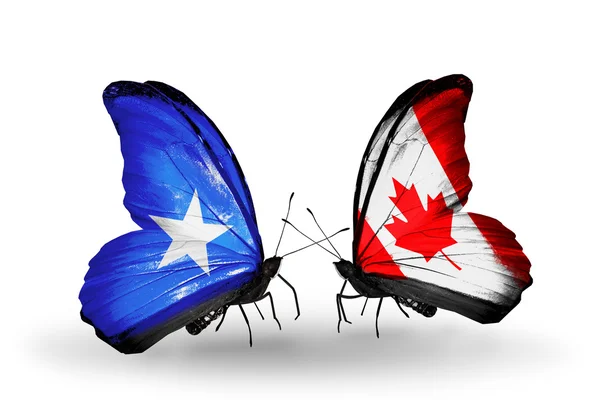 蝴蝶与索马里和加拿大国旗 — 图库照片