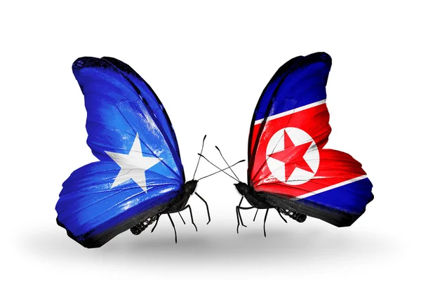 Butterflies with Somalia and North Korea flags — Stock Photo, Image