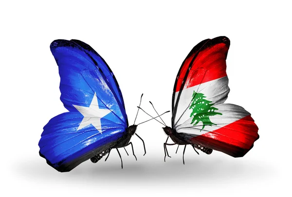 Бабочки с флагами Сомали и Ливана — стоковое фото