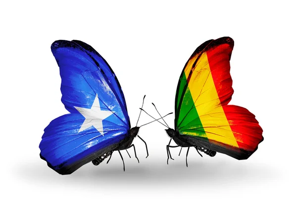 Schmetterlinge mit Somalien- und Mali-Flaggen auf Flügeln — Stockfoto