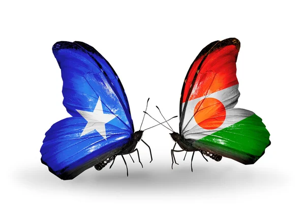 Butterflies with Somalia and Niger flags on wings — Stock Photo, Image