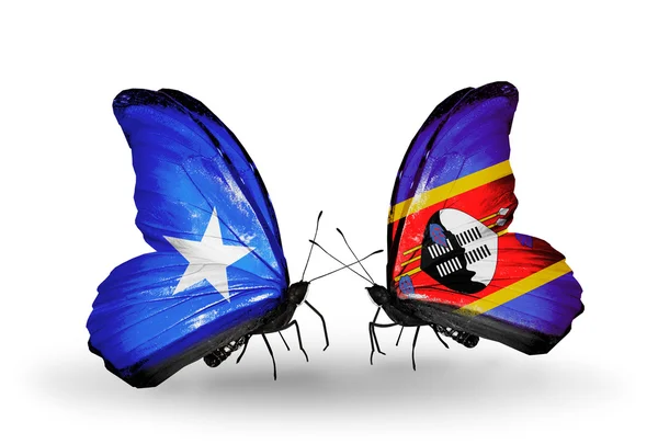 Papillons avec des drapeaux Somalie et Swaziland sur les ailes — Photo