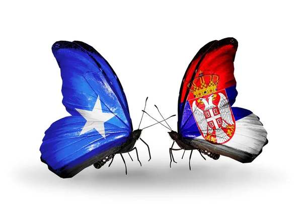 Motyle z Somalii i Serbia flagi na skrzydłach — Zdjęcie stockowe