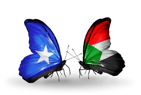 Butterflies with Somalia and Sudan flags on wings — Stock Photo, Image
