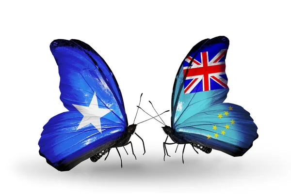 Mariposas con banderas de Somalia y Tuvalu en alas — Foto de Stock