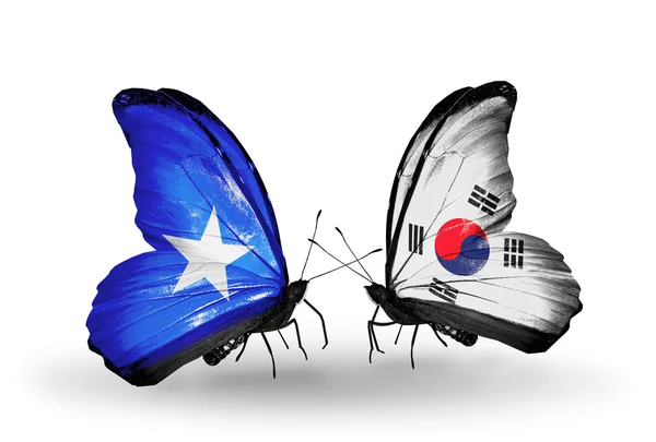 Farfalle con bandiere Somalia e Corea del Sud — Foto Stock