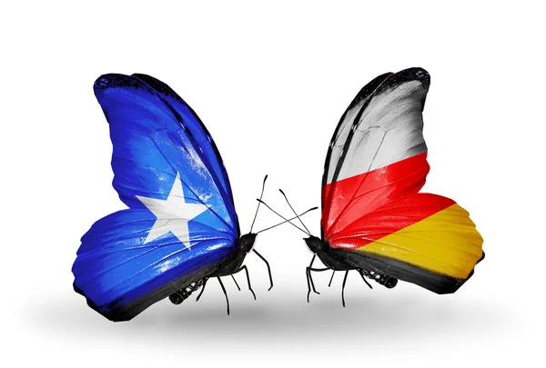 Motyle z Somalii i Osetii Południowej flagi — Zdjęcie stockowe