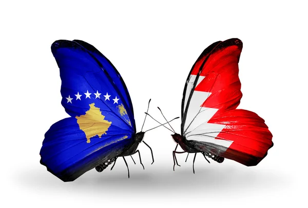Kelebekler Kosova ve Bahreyn bayrağı ile — Stok fotoğraf