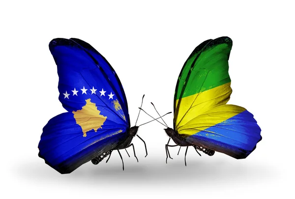 Butterflies with Kosovo and Gabon flags — Stock Photo, Image