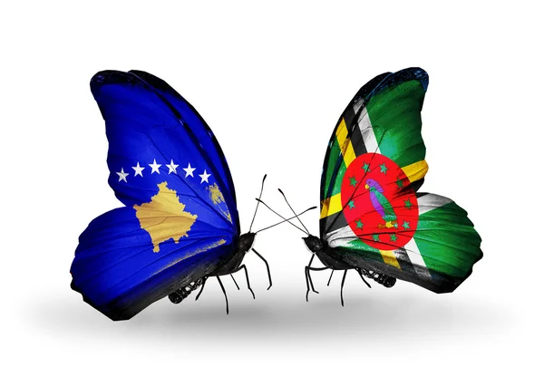 Butterflies with Kosovo and Dominica flags — Stock Photo, Image