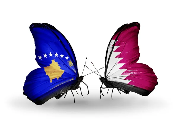 Butterflies with Kosovo and Qatar flags — Stock Photo, Image