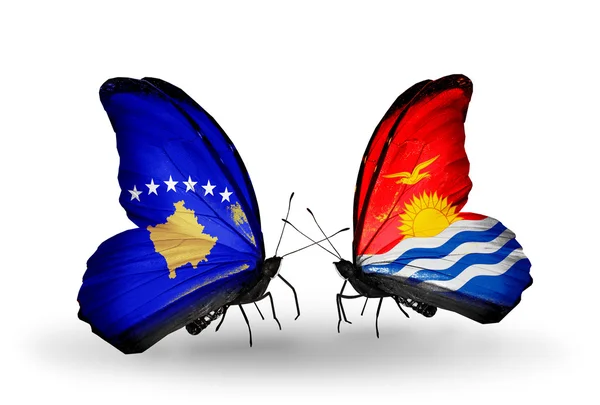 Fjärilar med Kosovo och Kiribati flaggor — Stockfoto