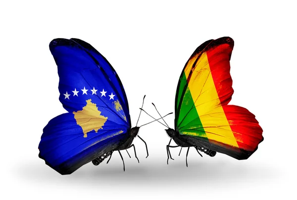 Fjärilar med Kosovo och Mali flaggor — Stockfoto