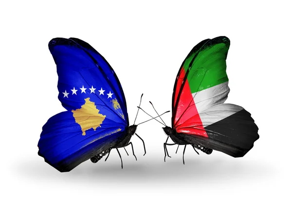 Butterflies with Kosovo and UAE flags — Stock Photo, Image