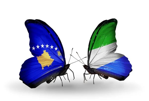 Butterflies with Kosovo and Sierra Leone flags — Stock Photo, Image