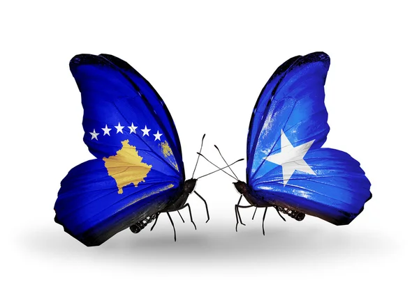 Mariposas con banderas de Kosovo y Somalia — Foto de Stock