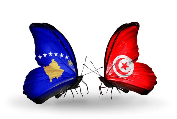 Motyle z Kosowa i Tunezja flagi — Zdjęcie stockowe