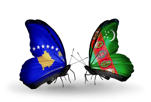 蝴蝶与科索沃和土库曼斯坦国旗 — 图库照片