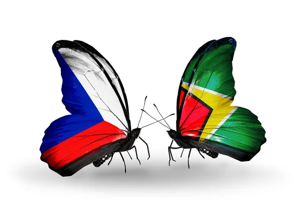 Mariposas con banderas checas y guyana — Foto de Stock