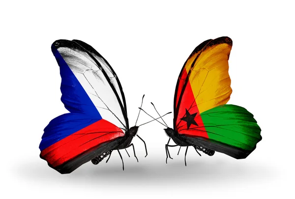 Butterflies with Czech and Guinea Bissau flags — Stock Photo, Image