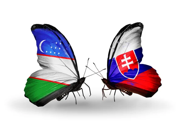 Butterflies with Uzbekistan and Slovakia flags — Stock Photo, Image