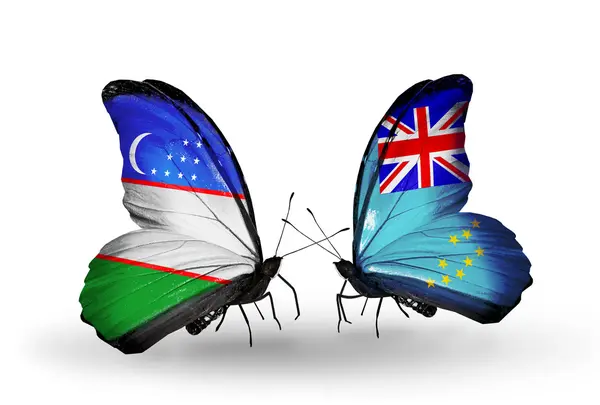 Butterflies with Uzbekistan and Tuvalu flags — Stock Photo, Image