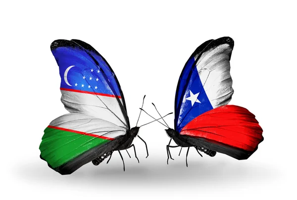 Butterflies with Uzbekistan and Chile flags — Stock Photo, Image