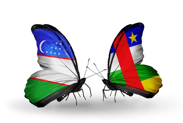 Butterflies with Uzbekistan and CAR flags — Stock Photo, Image