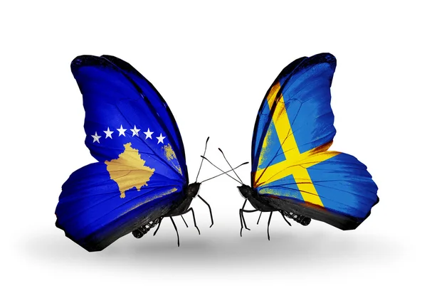 Butterflies with Kosovo and Sweden flags — Stock Photo, Image