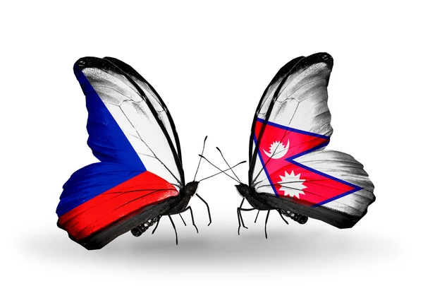 Nepal ve Çek bayrakları taşıyan kelebekler — Stok fotoğraf
