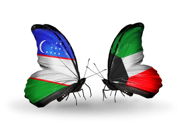 Farfalle con bandiere Uzbekistan e Kuwait — Foto Stock