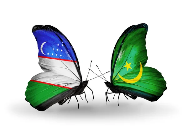Farfalle con bandiere Uzbekistan e Mauritania — Foto Stock
